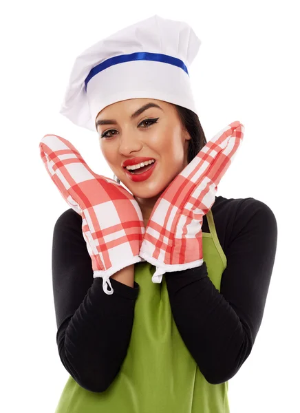 Woman wearing oven gloves — Stock Photo, Image