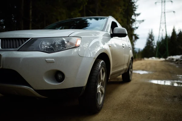 Offroad car on country road — Stock Photo, Image