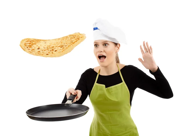 Beginner cook flipping pancake — Stock Photo, Image