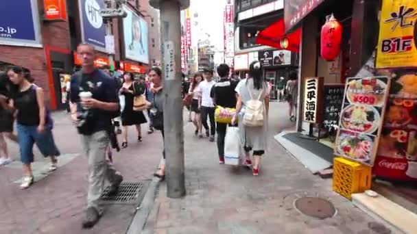 Multidões anônimas sobre Shibuya Discrit em Tóquio — Vídeo de Stock