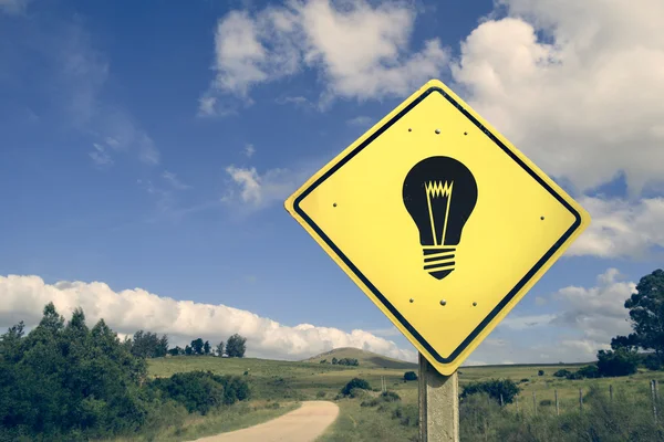 Idea lightbulb retro concept road sign — Stock Photo, Image