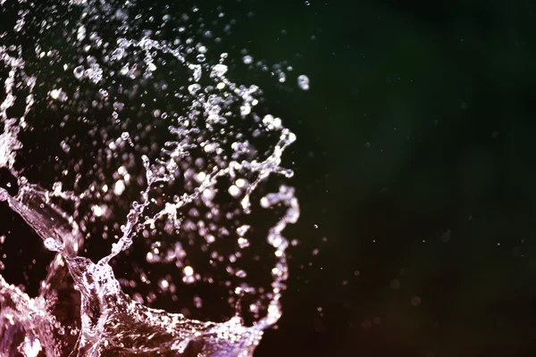 Water splash nature vintage black background — Stock Photo, Image