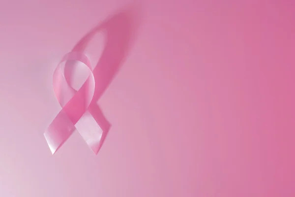 Breast cancer awareness ribbon pink background — Stock Photo, Image