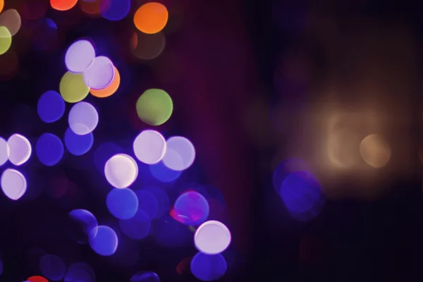 Navidad luces bokeh borroso color tarjeta de fondo — Foto de Stock