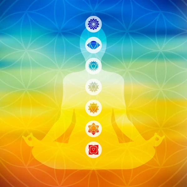 Yoga pose with chakra icons — Stock Vector