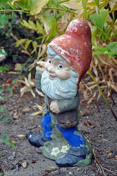 Old garden gnome Stock Photo