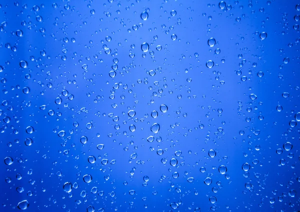 Regn droppe på glas som bakgrund — Stockfoto