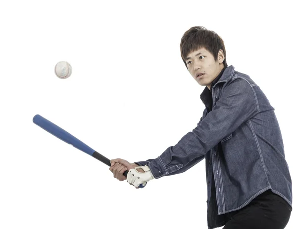 Man hiting baseball — Stock Photo, Image