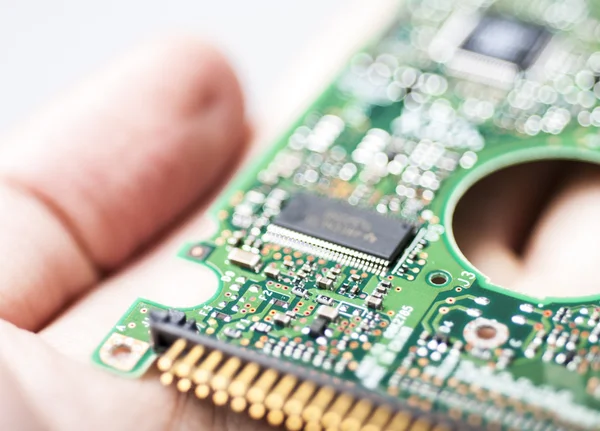 Circuit board in hand — Stock Photo, Image