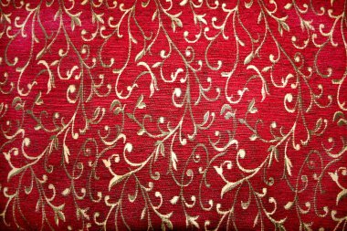Kırmızı kumaş üzerine gümüş iplik tasarım