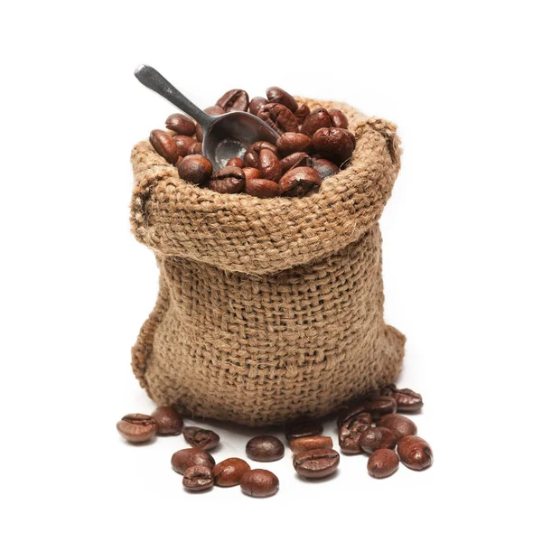 Coffee beans in burlap bag — Stock Photo, Image