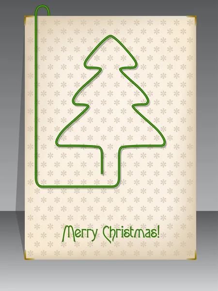 Kerstkaart met kerstboom vormige paperclip — Stockvector
