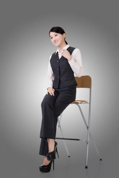 Business woman sit on a chair — Stock Photo, Image