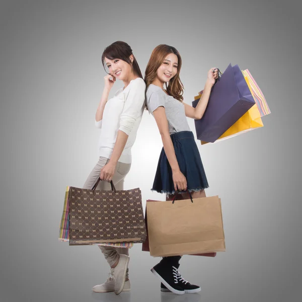 Happy smiling shopping girls — Stock Photo, Image