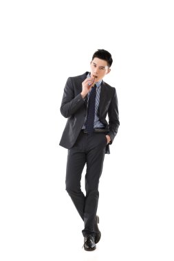 bir puro tutan işadamı