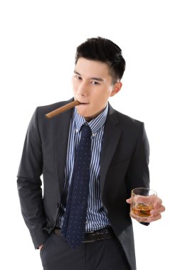 bir puro tutan işadamı