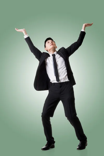 Holding pose of Asian business man — Stock Photo, Image