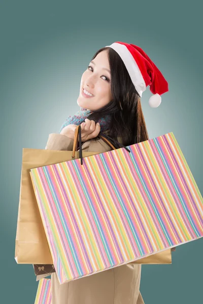 Happy shopping girl holding bags — Stock Photo, Image