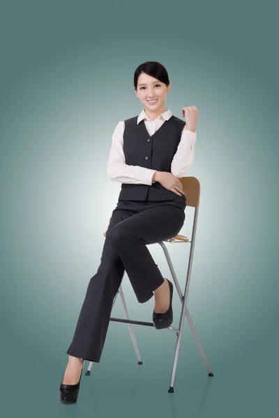 Business woman sit on a chair — Stock Photo, Image