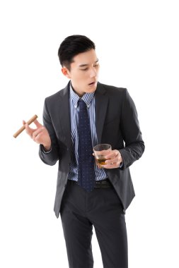 bir puro tutan işadamı