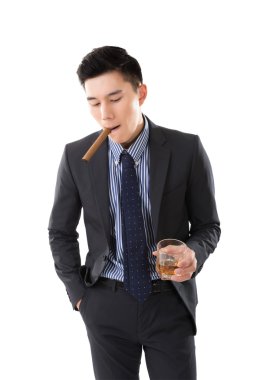 bir puro tutan işadamı