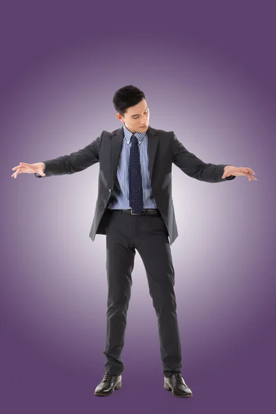 Holding pose of Asian business man — Stock Photo, Image