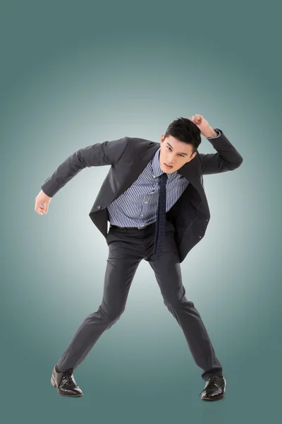 Struggle pose of Asian business man — Stock Photo, Image