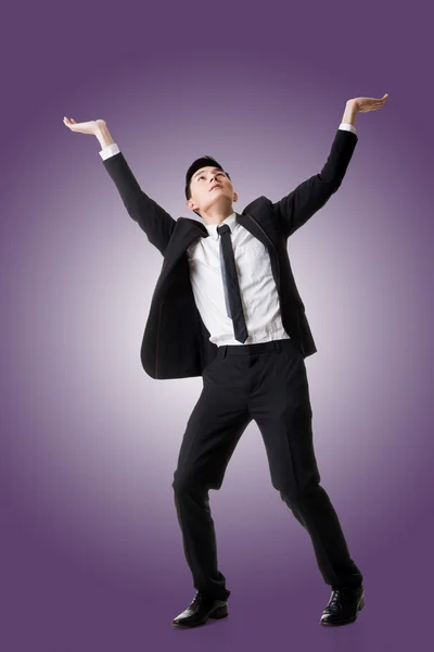 Holding pose of Asian business man — Stock Photo, Image