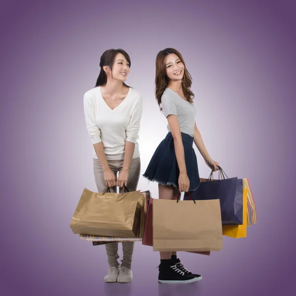 Happy smiling shopping girls — Stock Photo, Image