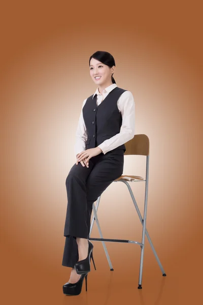 Business woman sit on a chair — Stock Photo, Image