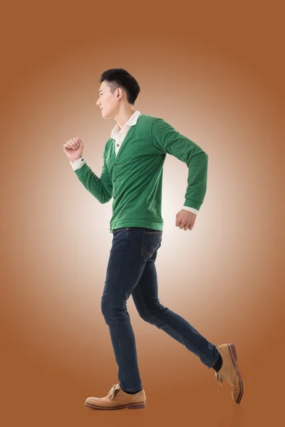 Asian young man running — Stock Photo, Image