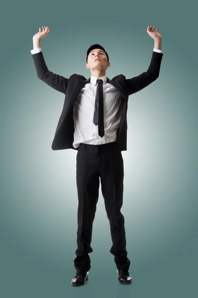 Holding pose of Asian business man — Stock Photo, Image