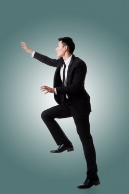 Asya işadamı tırmanma