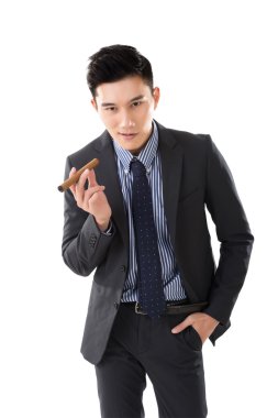 bir puro tutan işadamı