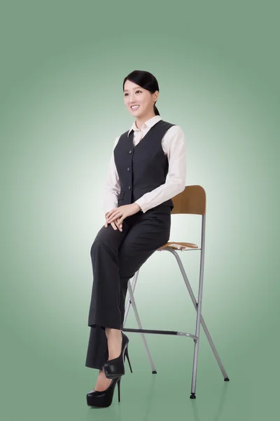 Business woman sit on a chair — Stock Photo, Image