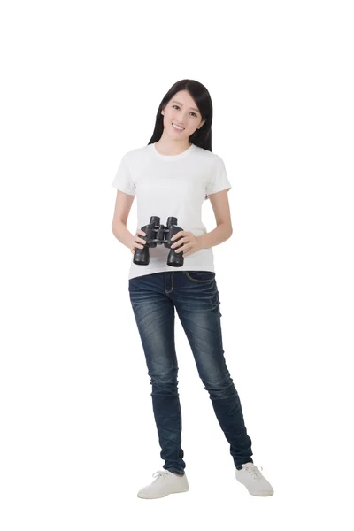 Woman using binoculars — Stock Photo, Image