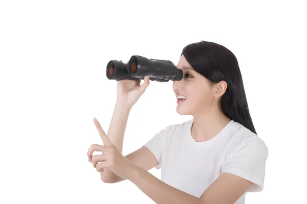 Woman using binoculars — Stock Photo, Image