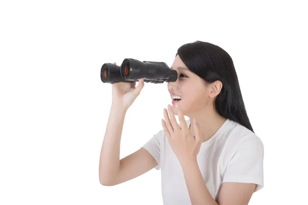 Woman using binoculars — Stock Photo, Image