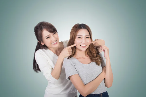 Asian woman with her friend — Stock Photo, Image