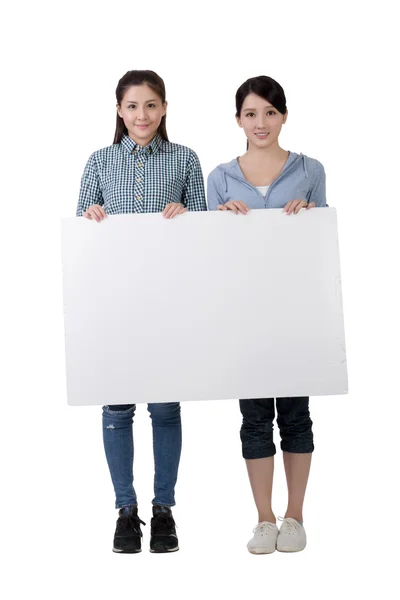 Woman holding blank board with friends — Stock Photo, Image