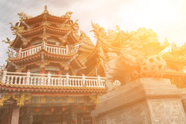 Color Chinese temple with lion stone — Stock Photo, Image