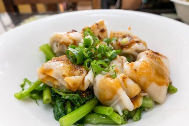 Taiwan traditional food of spicy wontons in a bowl