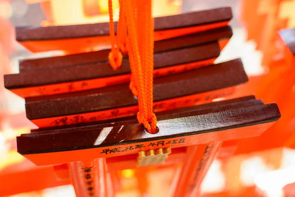 Votive tablets made of the shape of orange torii. — Stock Photo, Image