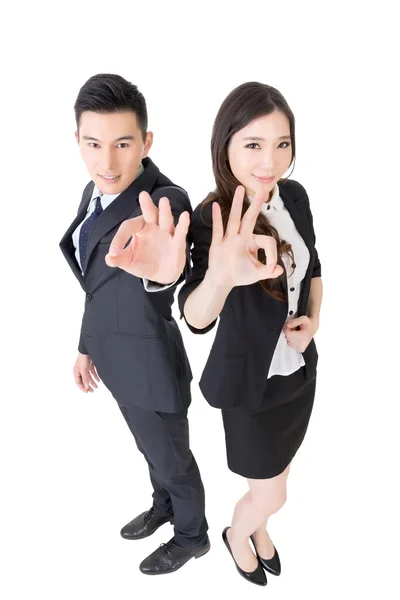 Business woman and man give you an okay sign — Stock Photo, Image