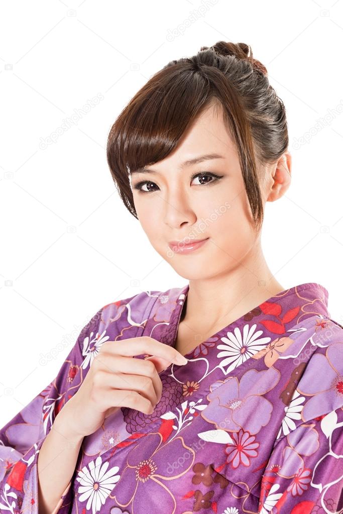 smiling Japanese beauty in traditional clothes