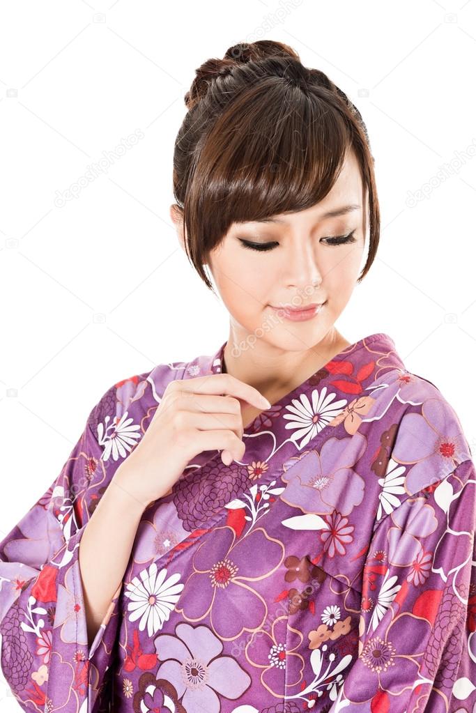 smiling Japanese beauty in traditional clothes