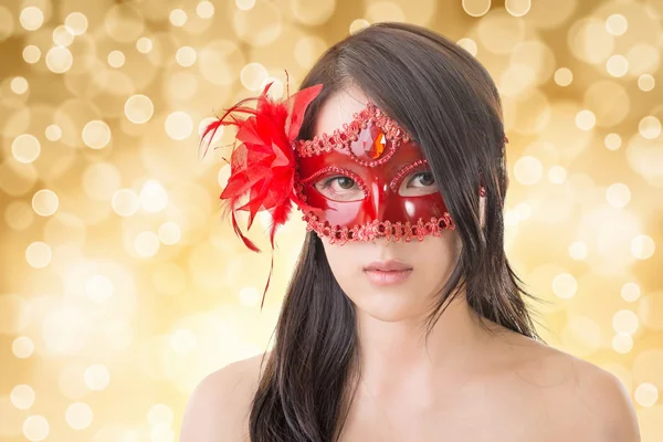 Woman in a carnival mask — Stock Photo, Image