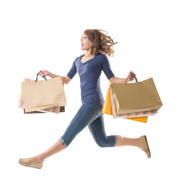 Shopping woman jumping — Stock Photo, Image