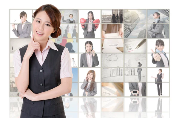 Woman standing in front of TV — Stock Photo, Image