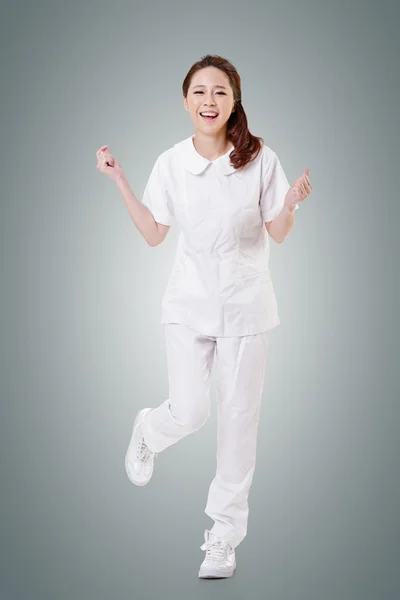 Cheerful Asian nurse — Stock Photo, Image